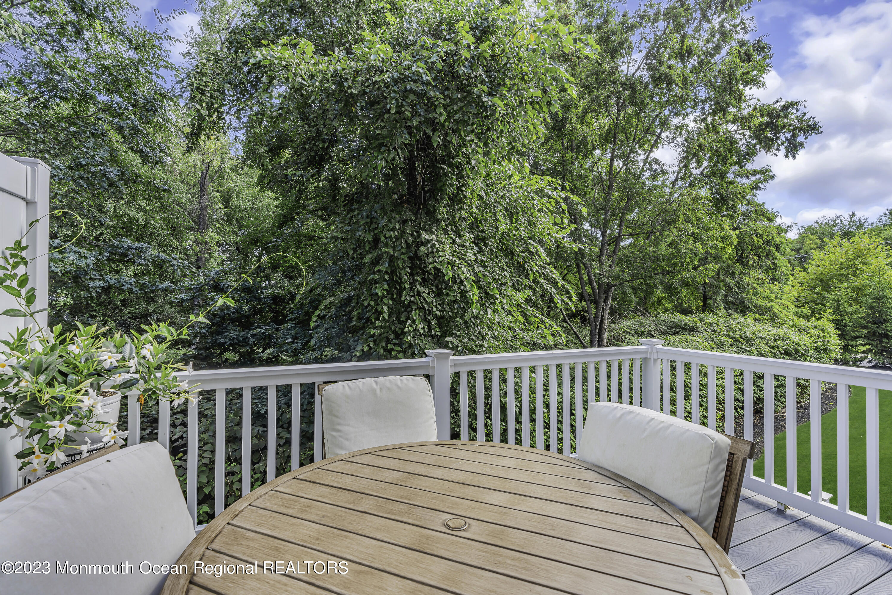 5 Cottrell Court Old Bridge, NJ 08857 - Photo 19 of 49 a view of a wooden deck and a forest