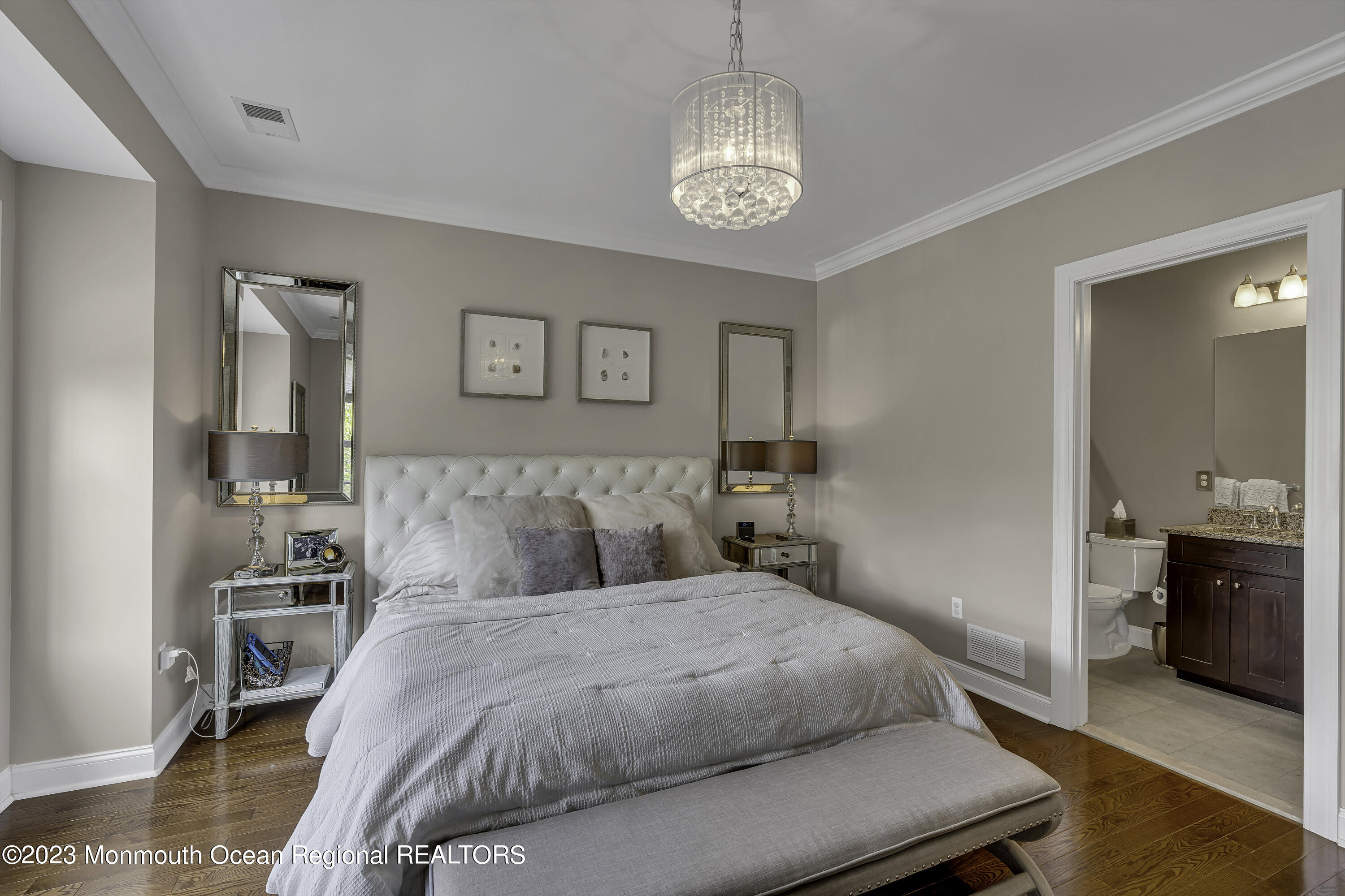 5 Cottrell Court Old Bridge, NJ 08857 - Photo 21 of 49 a bedroom with a large bed and a chandelier
