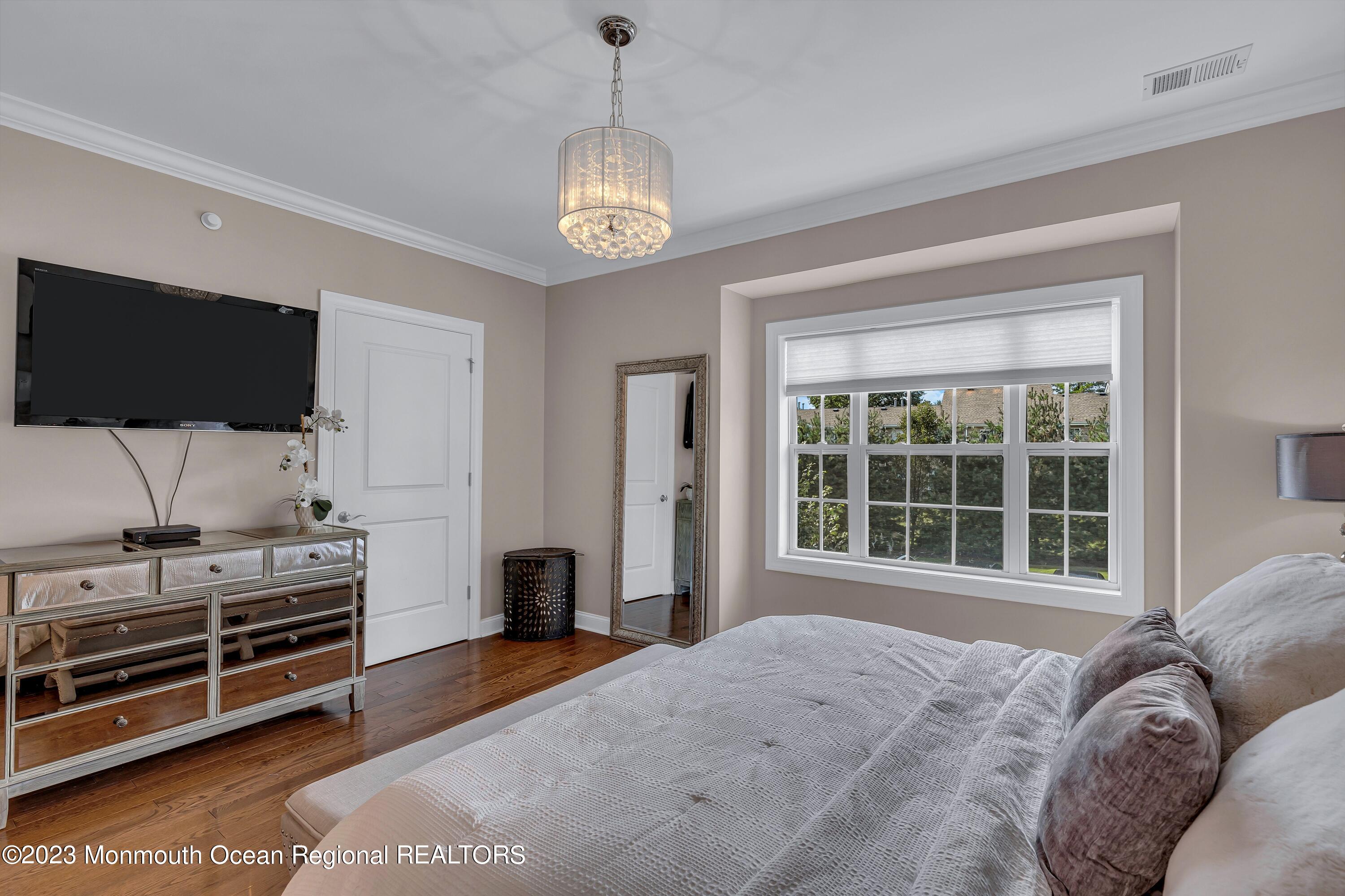 5 Cottrell Court Old Bridge, NJ 08857 - Photo 23 of 49 a bedroom with furniture and a flat screen tv