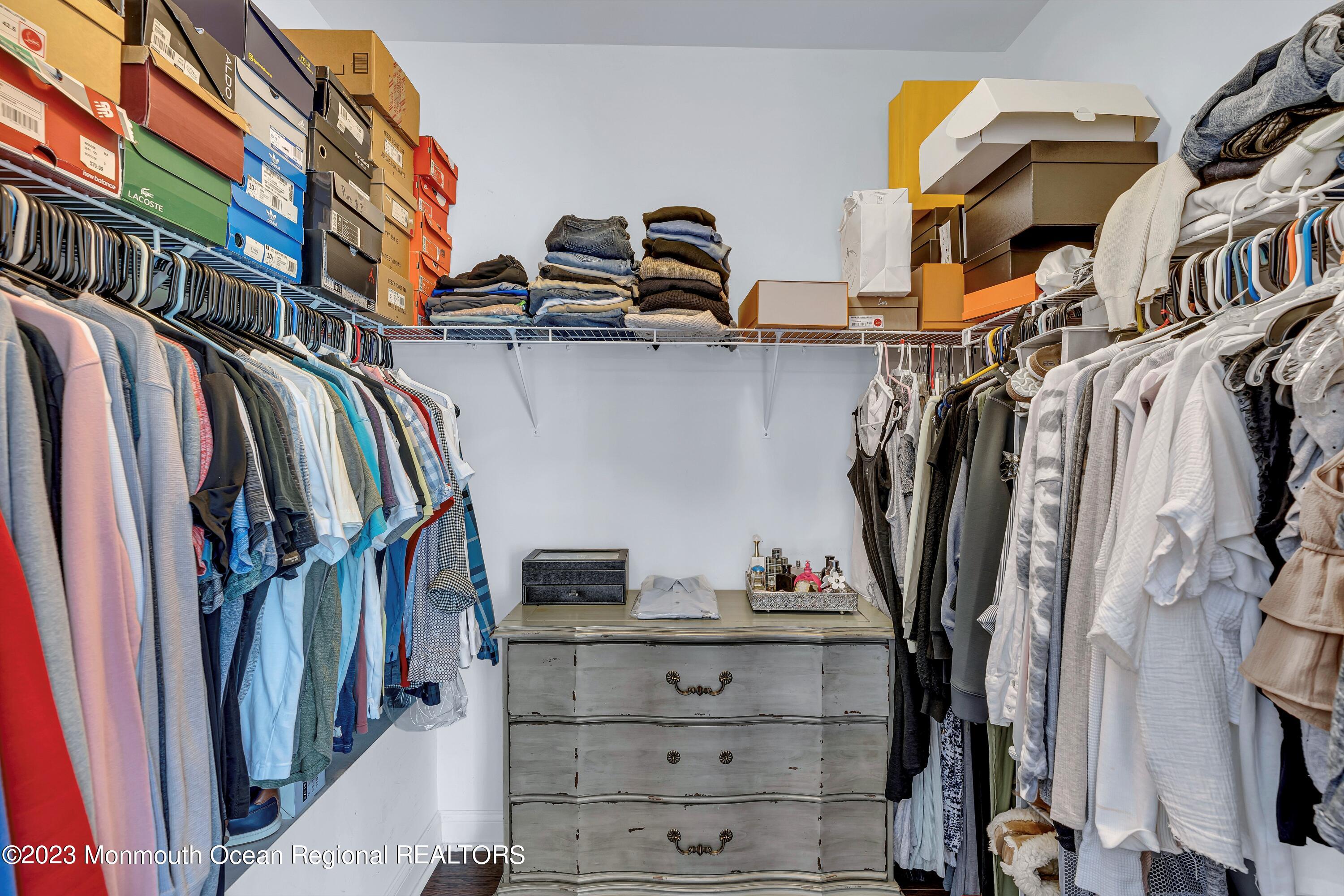 5 Cottrell Court Old Bridge, NJ 08857 - Photo 25 of 49 a view of walk in closet with clothes and shoes