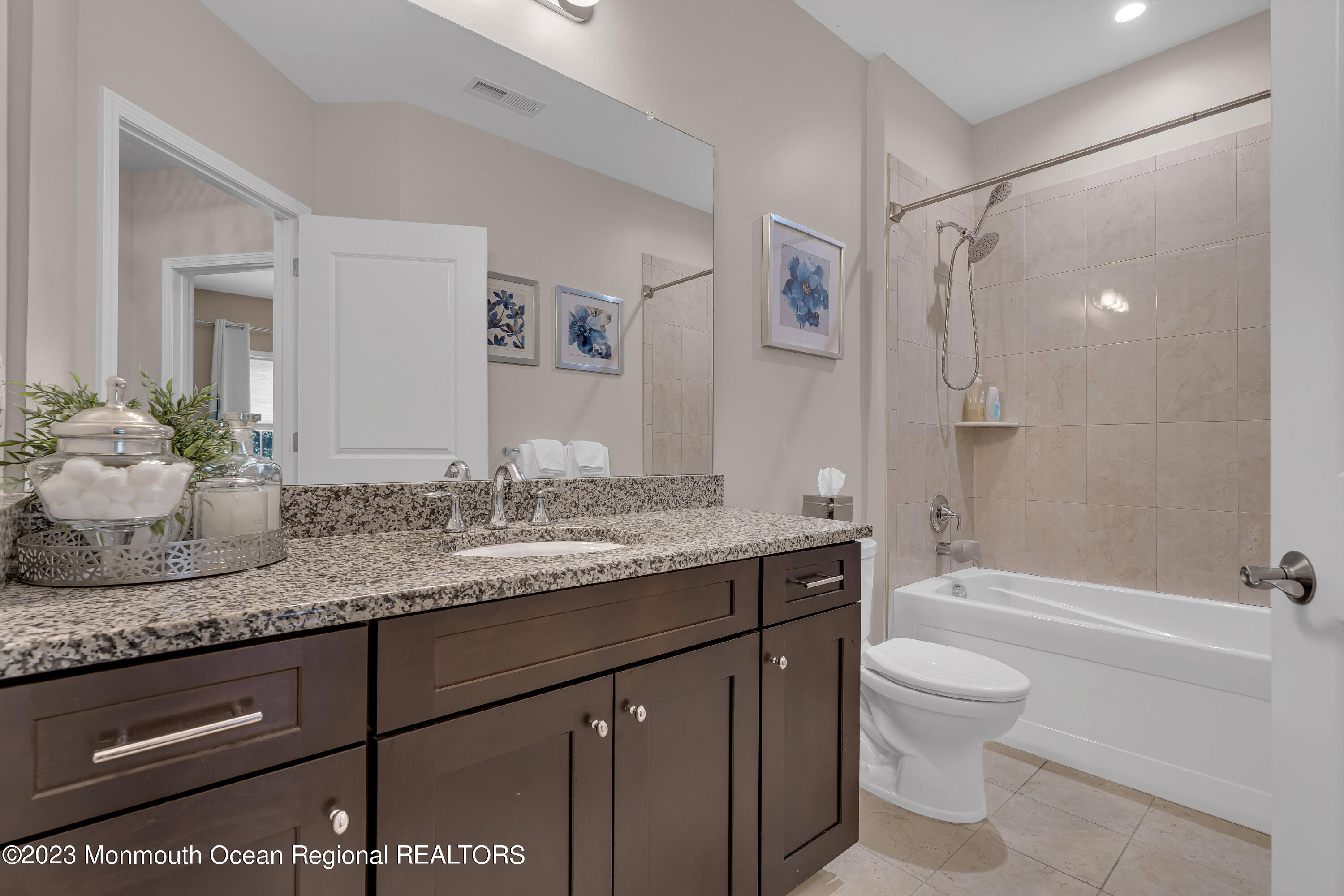 5 Cottrell Court Old Bridge, NJ 08857 - Photo 27 of 49 a bathroom with a granite countertop sink a toilet and shower