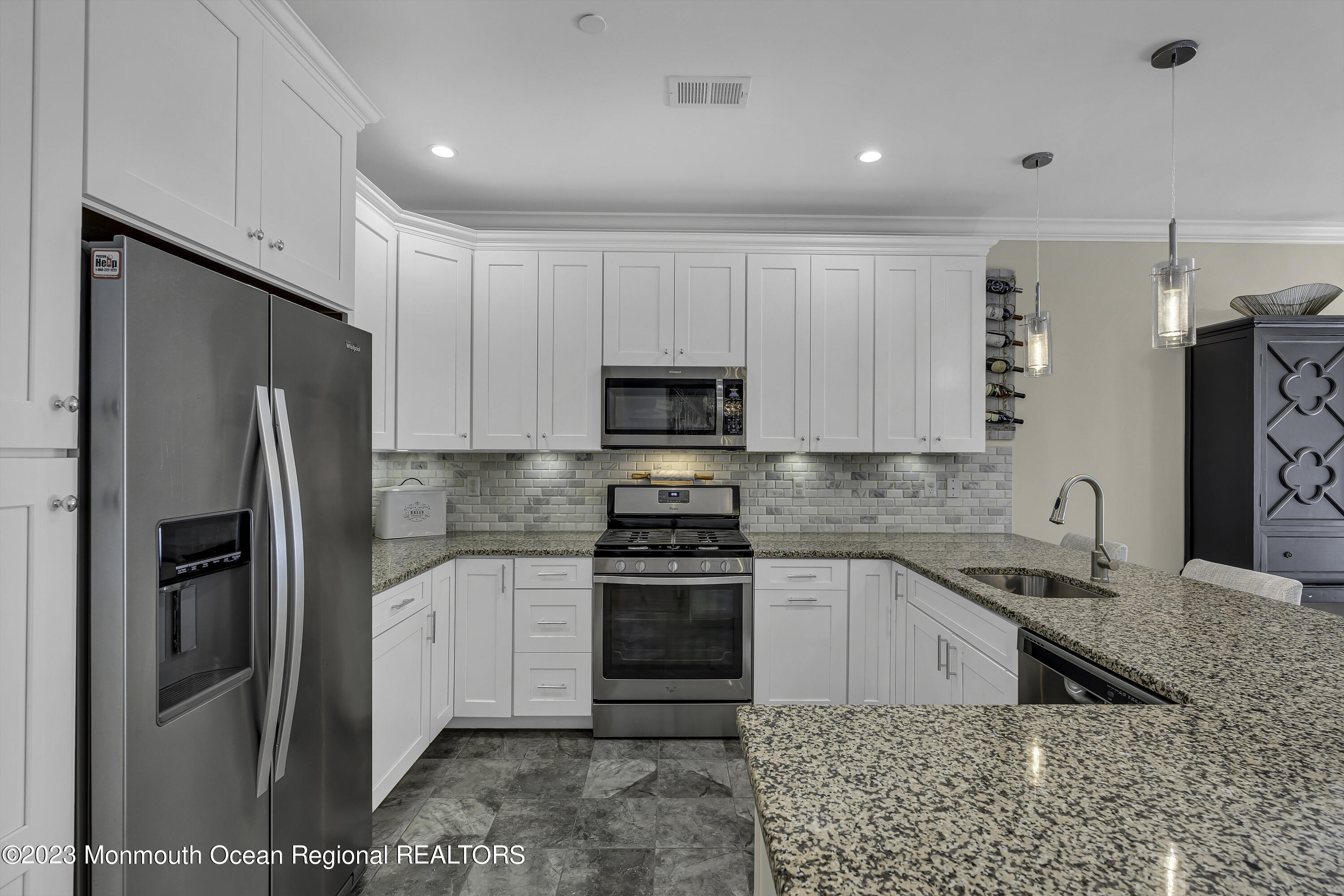 5 Cottrell Court Old Bridge, NJ 08857 - Photo 8 of 49 a kitchen with stainless steel appliances granite countertop a refrigerator stove and sink