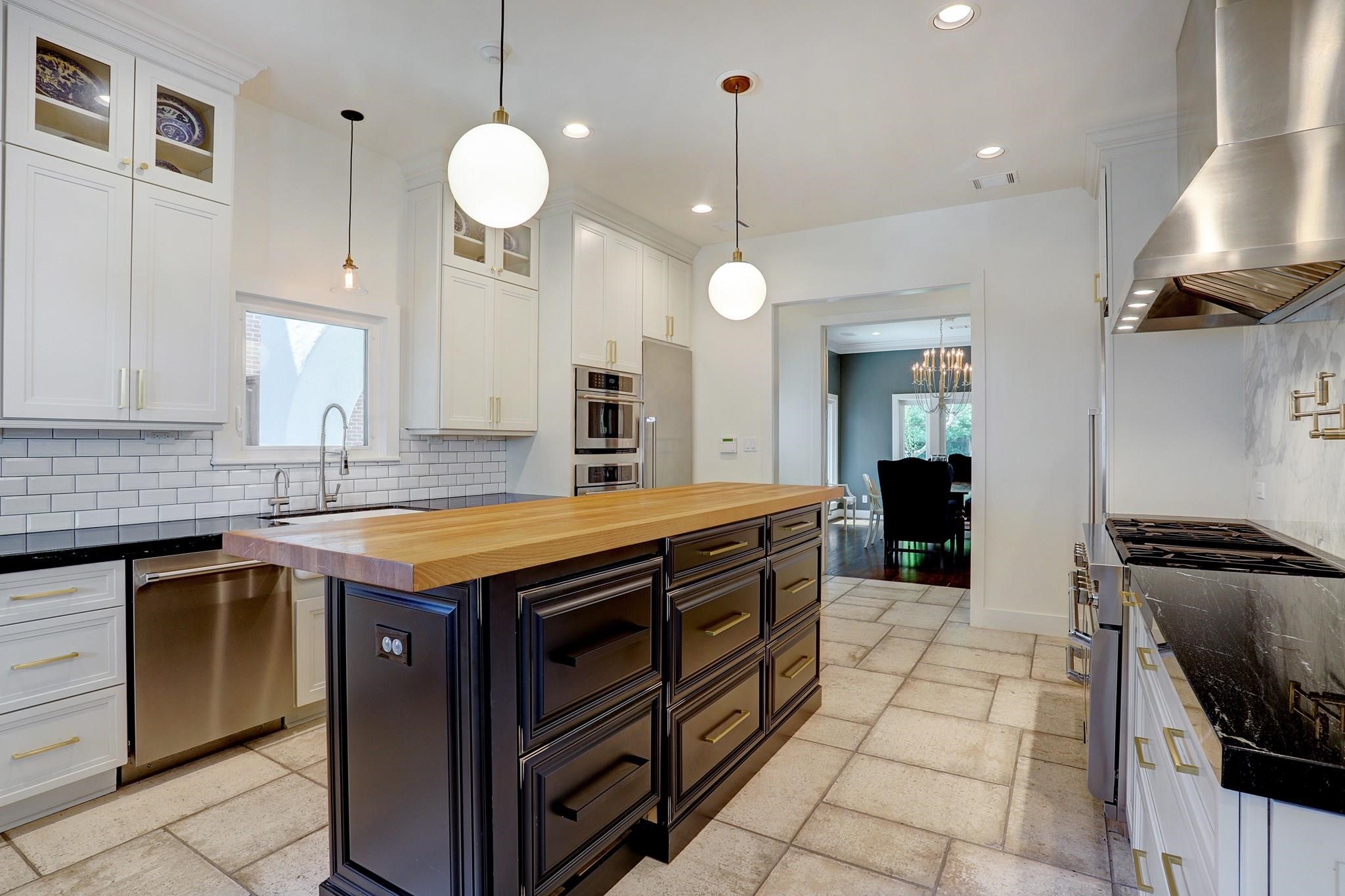 3779 Robinhood Street Houston, TX 77005 - Photo 3 of 17 Feet upon feet of prep space! Refrigerated island drawers.