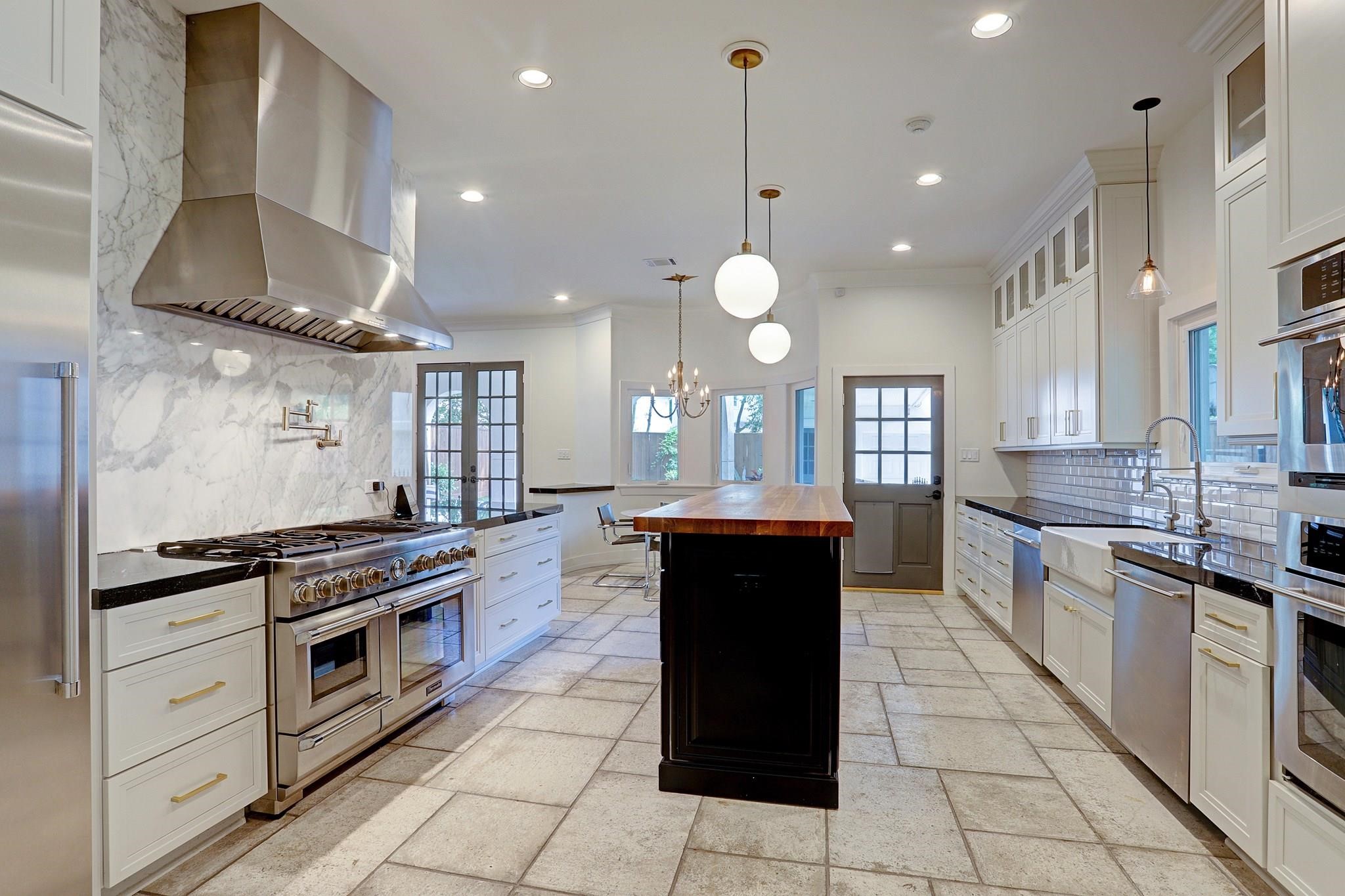 3779 Robinhood Street Houston, TX 77005 - Photo 10 of 17 Top of the line kitchen with 3 ovens, dual dishwashers, separate freezer/refrigerator.