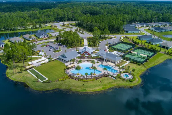 a view of a swimming pool with a patio