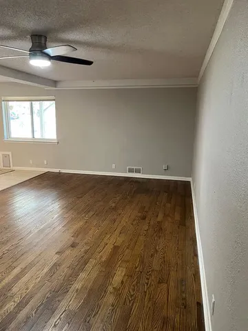a bathroom with a sink vanity and a mirror
