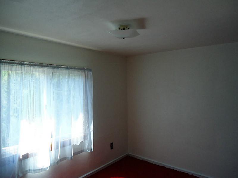 3128 Ridge Avenue Aliquippa, PA 15001 - Photo 13 of 24 Bedroom. One of two upstairs bedrooms.