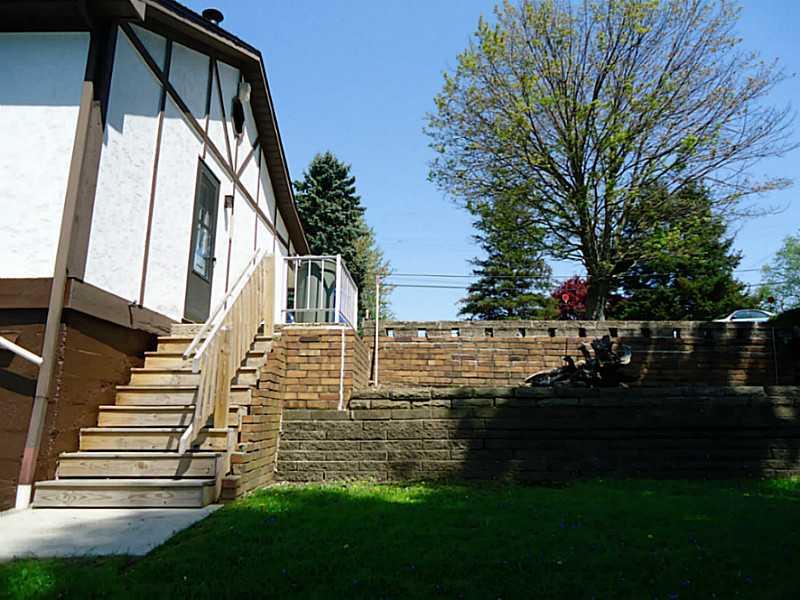 3128 Ridge Avenue Aliquippa, PA 15001 - Photo 21 of 24 Exterior Back. Large planter bed to fill up with flowers.