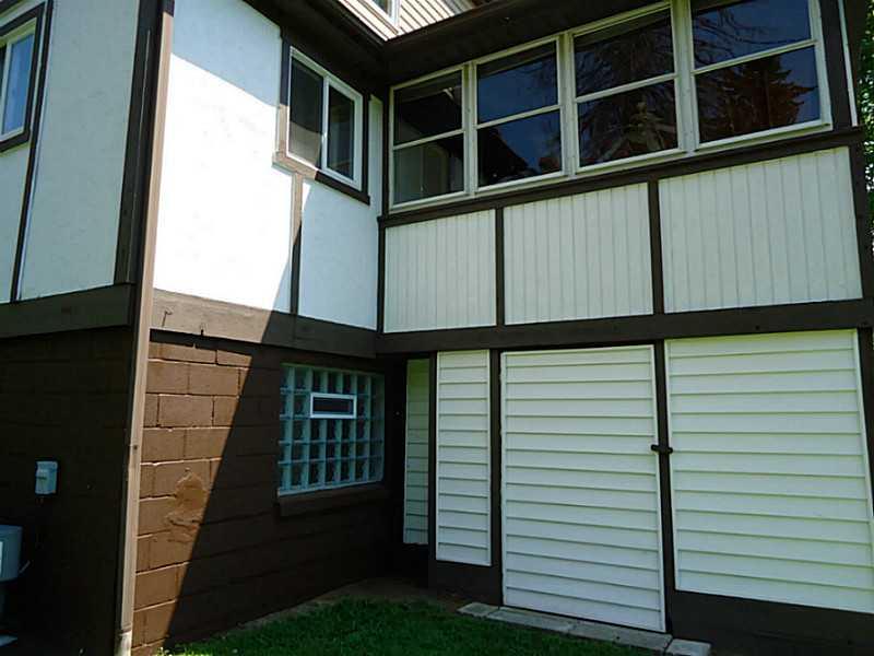 3128 Ridge Avenue Aliquippa, PA 15001 - Photo 22 of 24 Exterior Back. One of two doors to the storage under the sunroom.