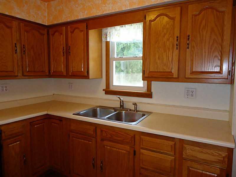 3128 Ridge Avenue Aliquippa, PA 15001 - Photo 6 of 24 Kitchen. Nice cabinets and counter tops with view to back yard.