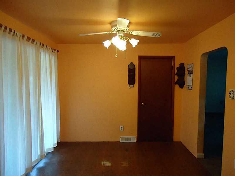 3128 Ridge Avenue Aliquippa, PA 15001 - Photo 9 of 24 Dining Room. This area is open to the kitchen with sliding doors to sunroom.