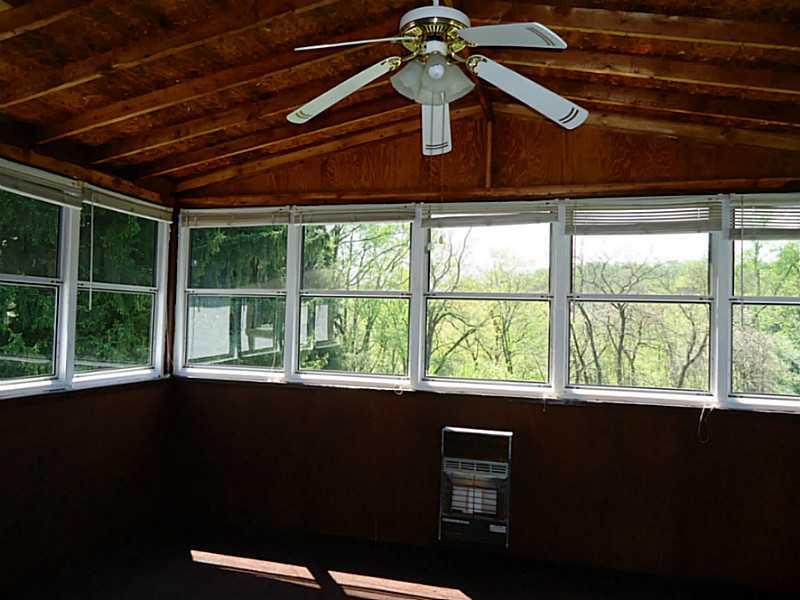 3128 Ridge Avenue Aliquippa, PA 15001 - Photo 10 of 24 Sunroom. Great room to hang out in and enjoy the view.