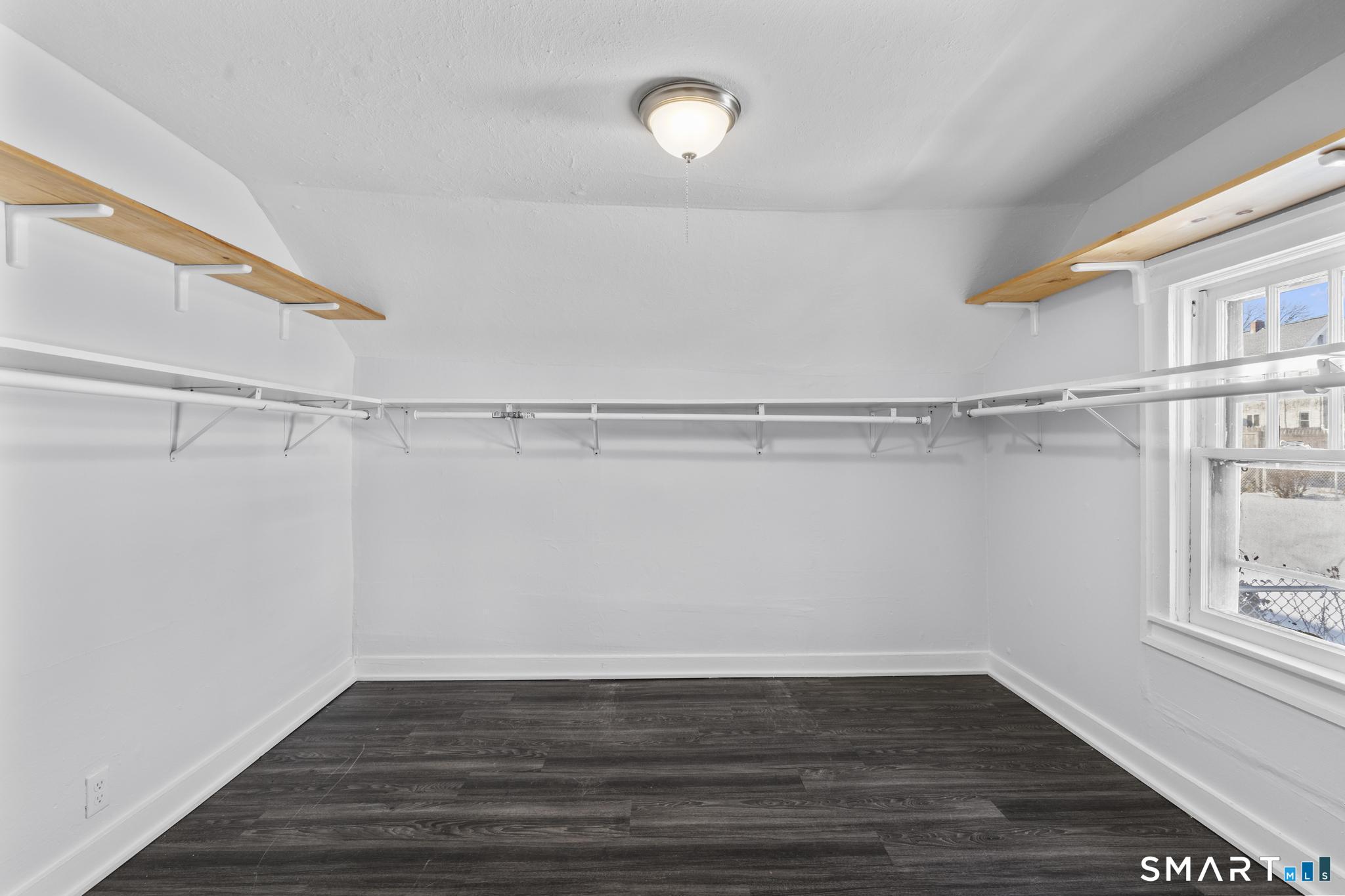 59 Pine Street Hamden, CT 06514 - Photo 13 of 36 a view of a room with racks on the wall