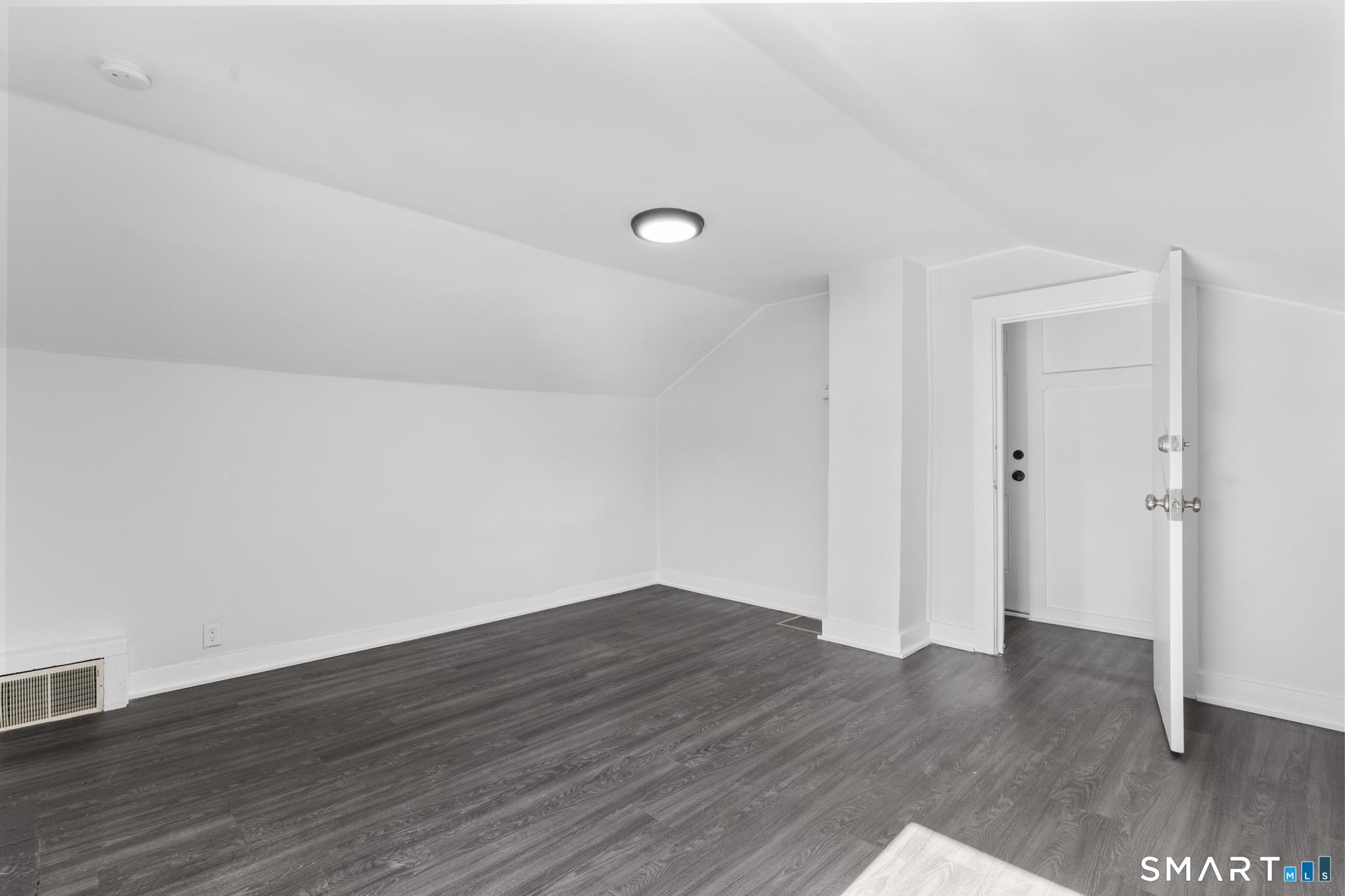 59 Pine Street Hamden, CT 06514 - Photo 30 of 36 a view of a room with wooden floor