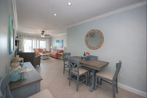 a view of a livingroom with furniture and a chandelier