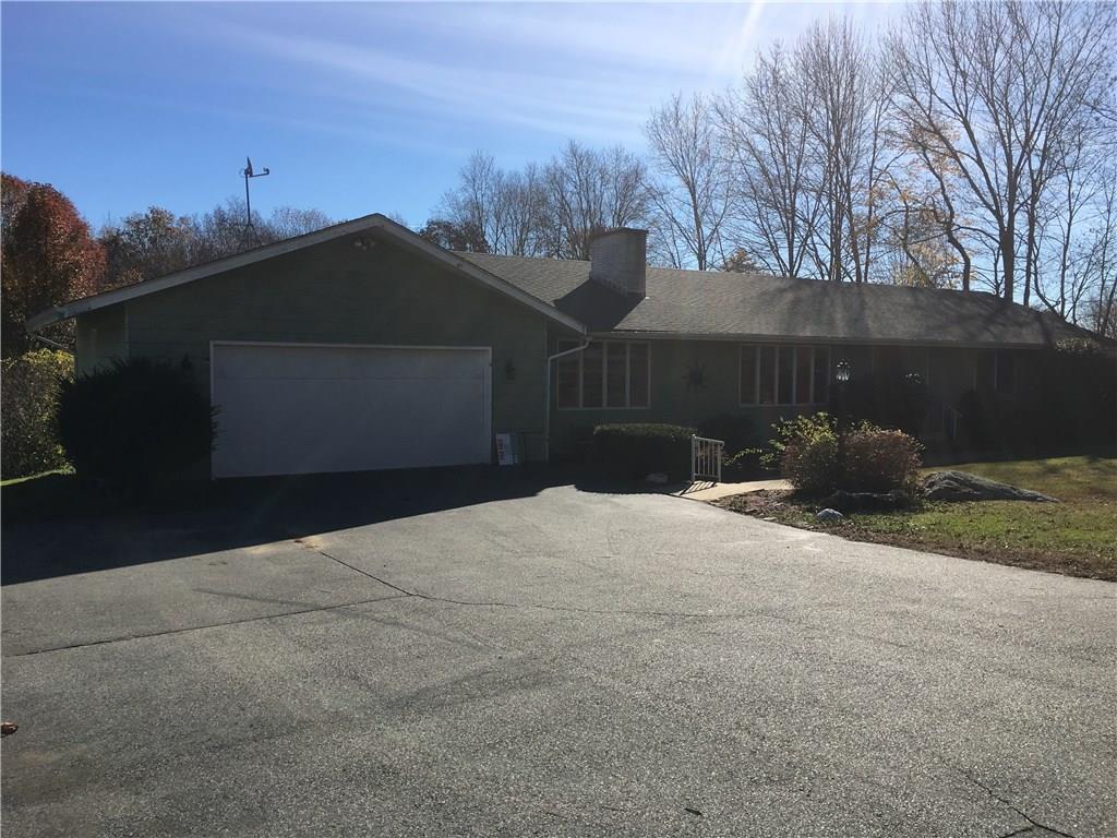 289 Miller Road Preston, CT 06365 - Photo 1 of 1 a front view of a house with a yard and garage