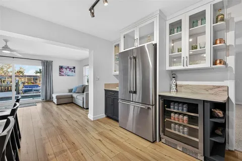 a large kitchen with stainless steel appliances granite countertop a large counter top and stove