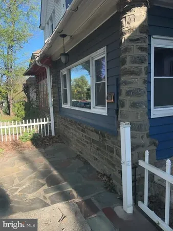 a view of a porch with a bench