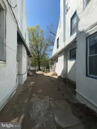 a view of a street with big house