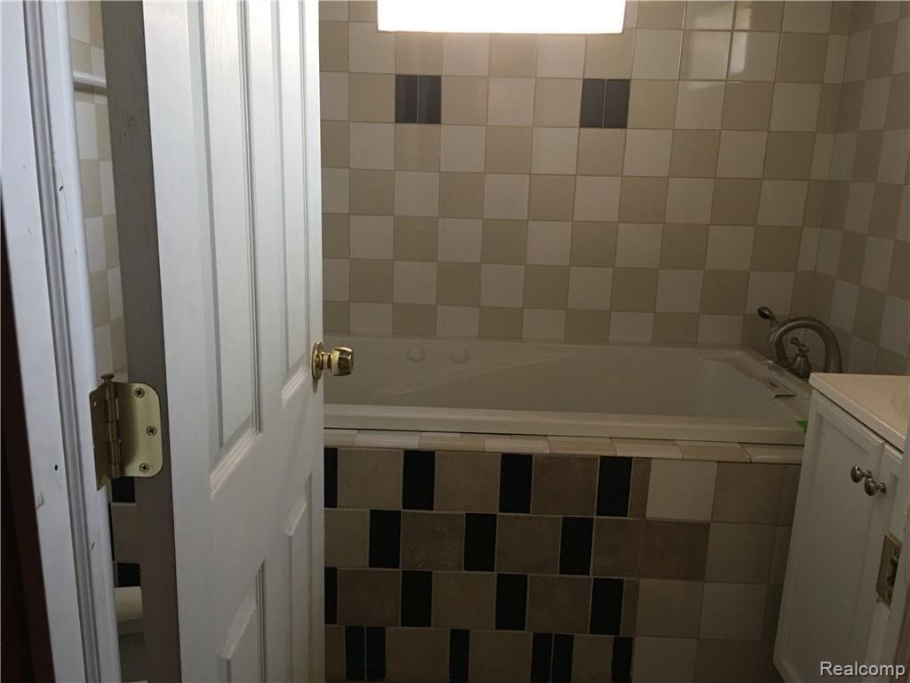 15770 Ashton Road Detroit, MI 48223 - Photo 17 of 21 Basement full bath
