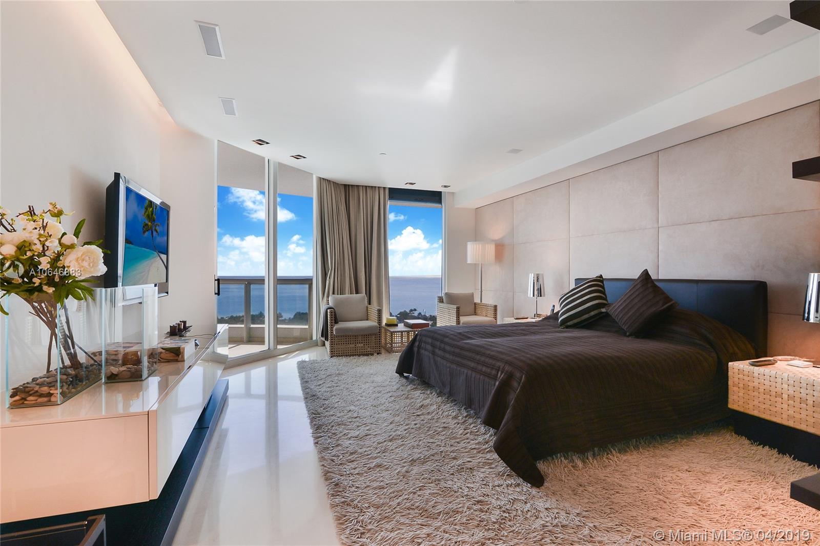 21200 Point Place Aventura, FL 33180 - Photo 23 of 35 MASTER BEDROOM FACING THE OCEAN - HIS AND HERS BATHROOMS