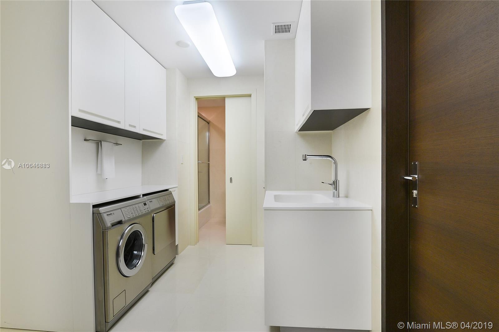 21200 Point Place Aventura, FL 33180 - Photo 32 of 35 LAUNDRY ROOM AND STAFF ROOM WITH FULL BATHROOM - NOTE LINE 05 IS THE ONLY ONE WITH SERVICE ENTRANCE
