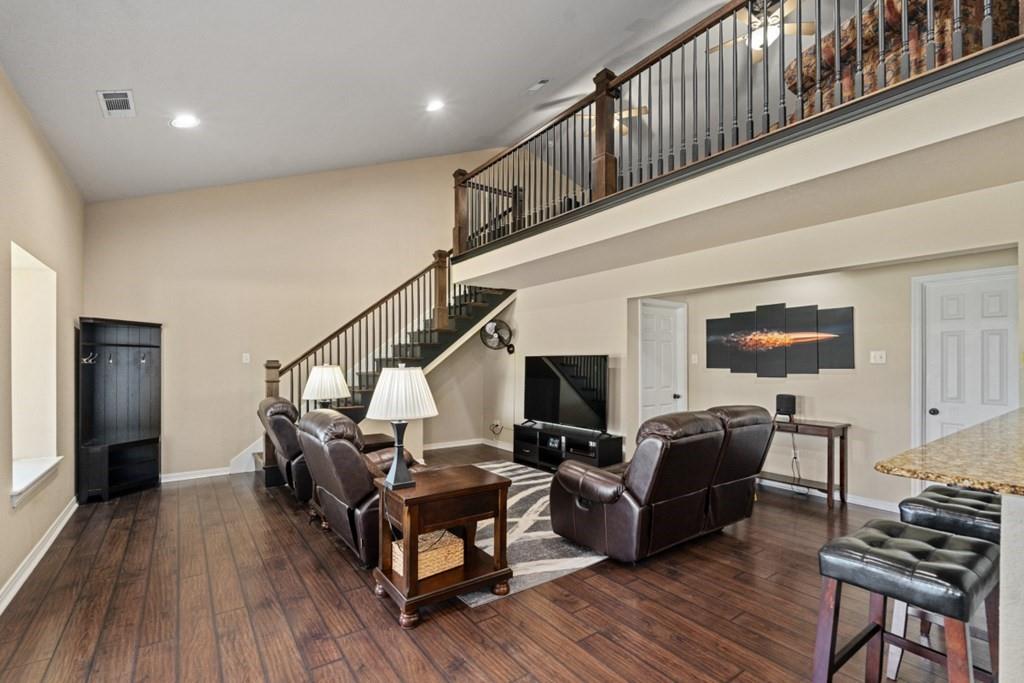 455 County Road 2808 Mabank, TX 75147 - Photo 18 of 40 a living room with furniture and a wooden floor