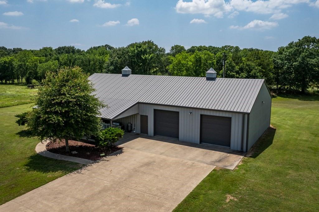 455 County Road 2808 Mabank, TX 75147 - Photo 6 of 40 a house with a yard