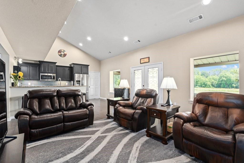 455 County Road 2808 Mabank, TX 75147 - Photo 10 of 40 a living room with furniture kitchen and a window