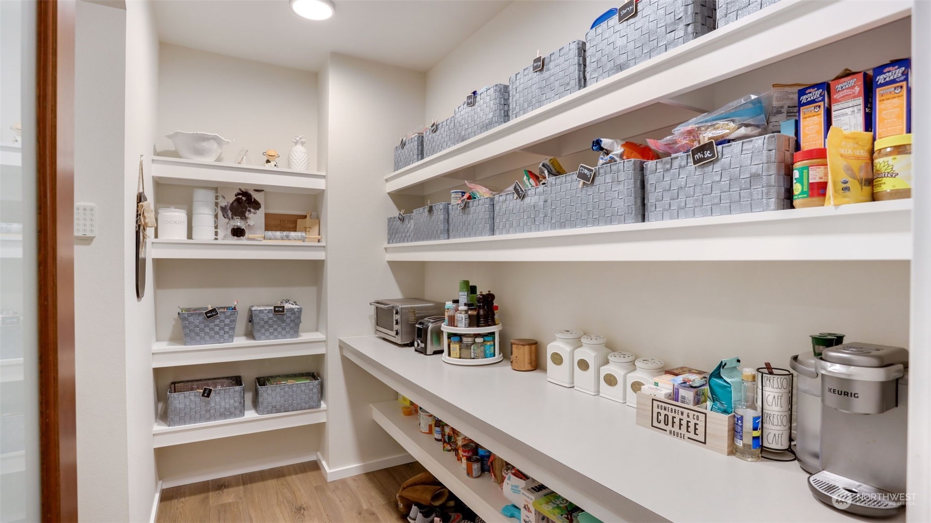 23922 Southeast 258th Way Maple Valley, WA 98038 - Photo 12 of 30 a utility room with lots of clutter and cabinets