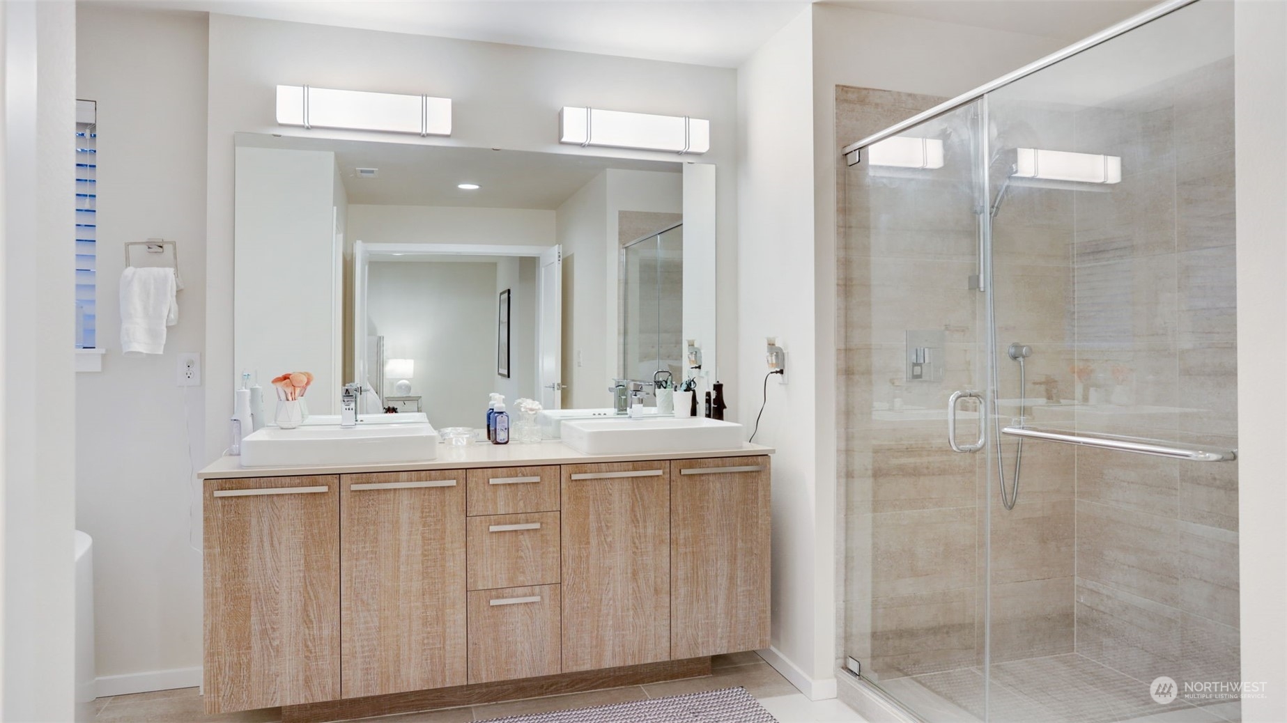 23922 Southeast 258th Way Maple Valley, WA 98038 - Photo 18 of 30 a bathroom with a double vanity sink mirror and shower