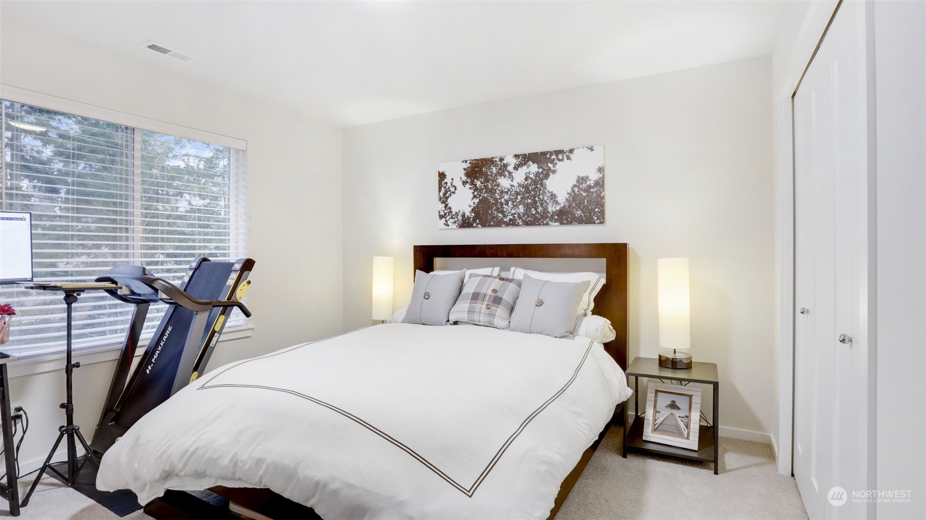 23922 Southeast 258th Way Maple Valley, WA 98038 - Photo 21 of 30 a bed room with a bed and a night stand