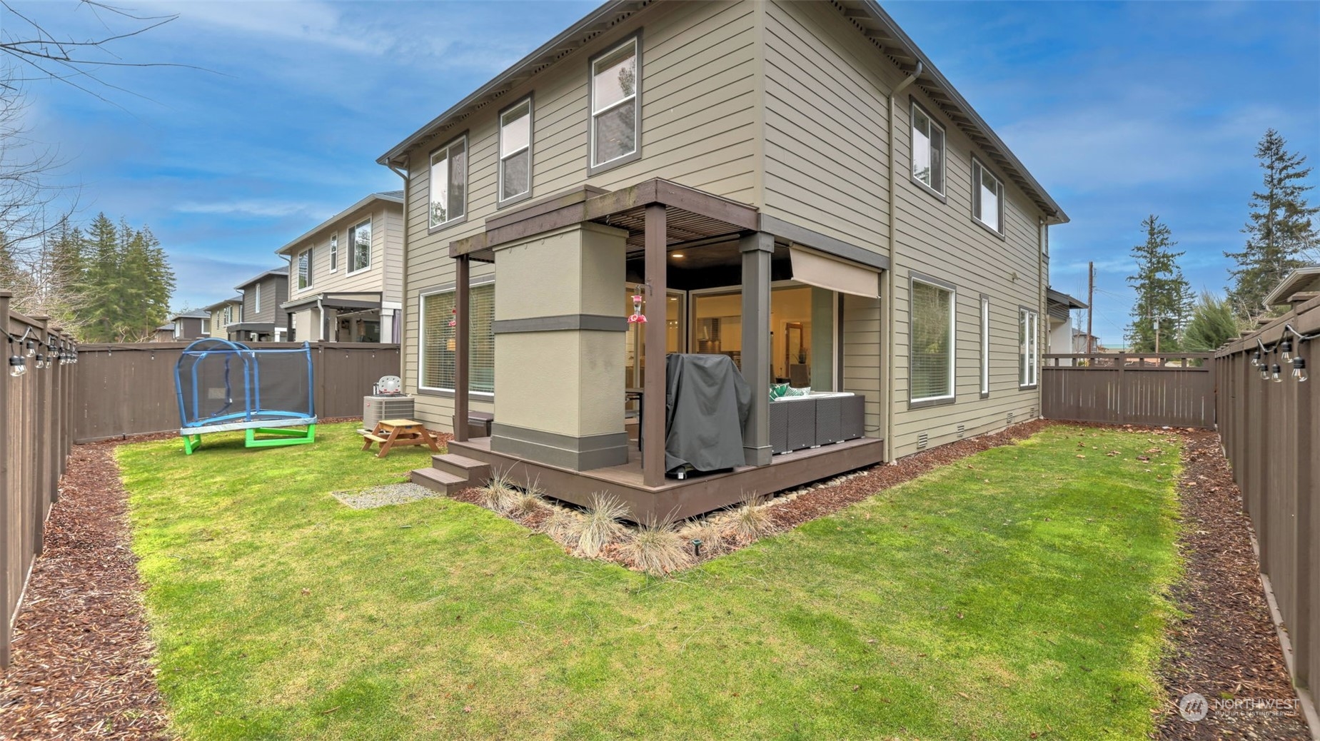 23922 Southeast 258th Way Maple Valley, WA 98038 - Photo 26 of 30 a view of a house with backyard