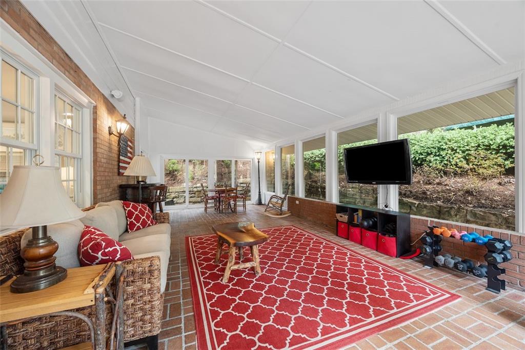 1014 Osage Road Pittsburgh, PA 15243 - Photo 14 of 49 a living room with furniture and a flat screen tv