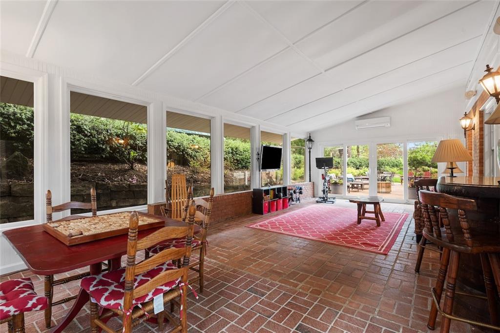 1014 Osage Road Pittsburgh, PA 15243 - Photo 15 of 49 a living room with furniture a large window and a table