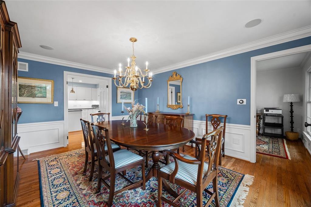 1014 Osage Road Pittsburgh, PA 15243 - Photo 22 of 49 a view of a dining room with furniture and wooden floor