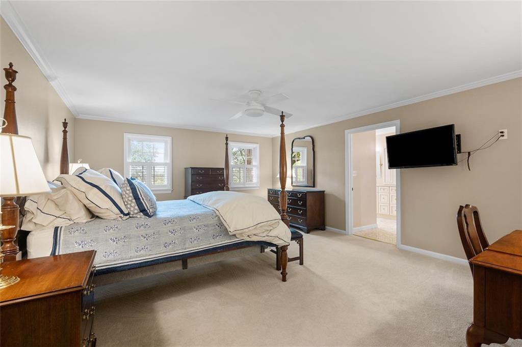 1014 Osage Road Pittsburgh, PA 15243 - Photo 25 of 49 a bedroom with furniture and a flat screen tv