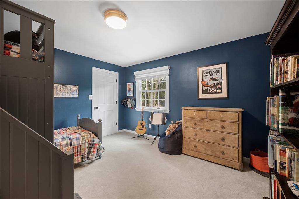 1014 Osage Road Pittsburgh, PA 15243 - Photo 32 of 49 a bedroom with a bed and furniture