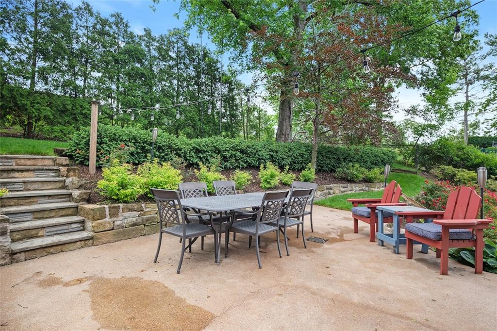 1014 Osage Road Pittsburgh, PA 15243 - Photo 42 of 49 a view of a dining tables and chairs in a patio