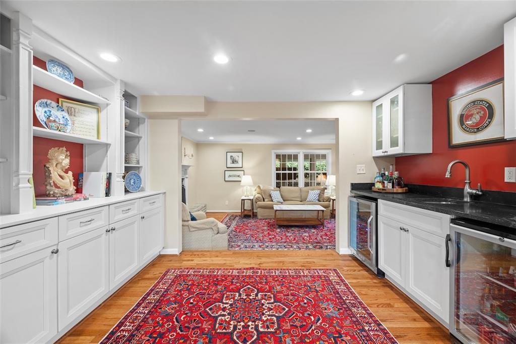 1014 Osage Road Pittsburgh, PA 15243 - Photo 8 of 49 a large kitchen with stainless steel appliances granite countertop a sink and dishwasher stove with wooden floor