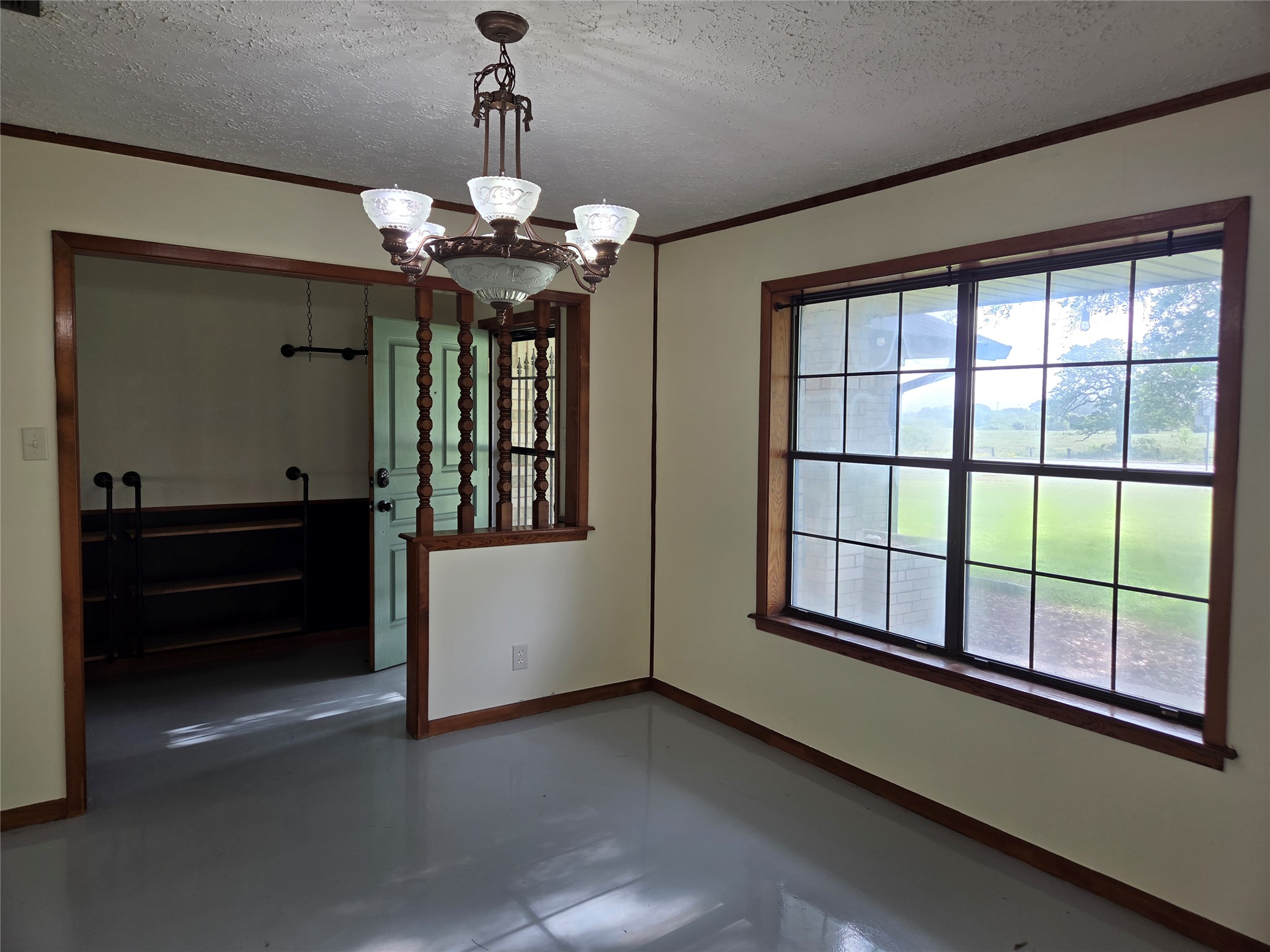 5953 Fm 141 Dime Box, TX 77853 - Photo 5 of 20 a view of a livingroom with a chandelier fan and windows