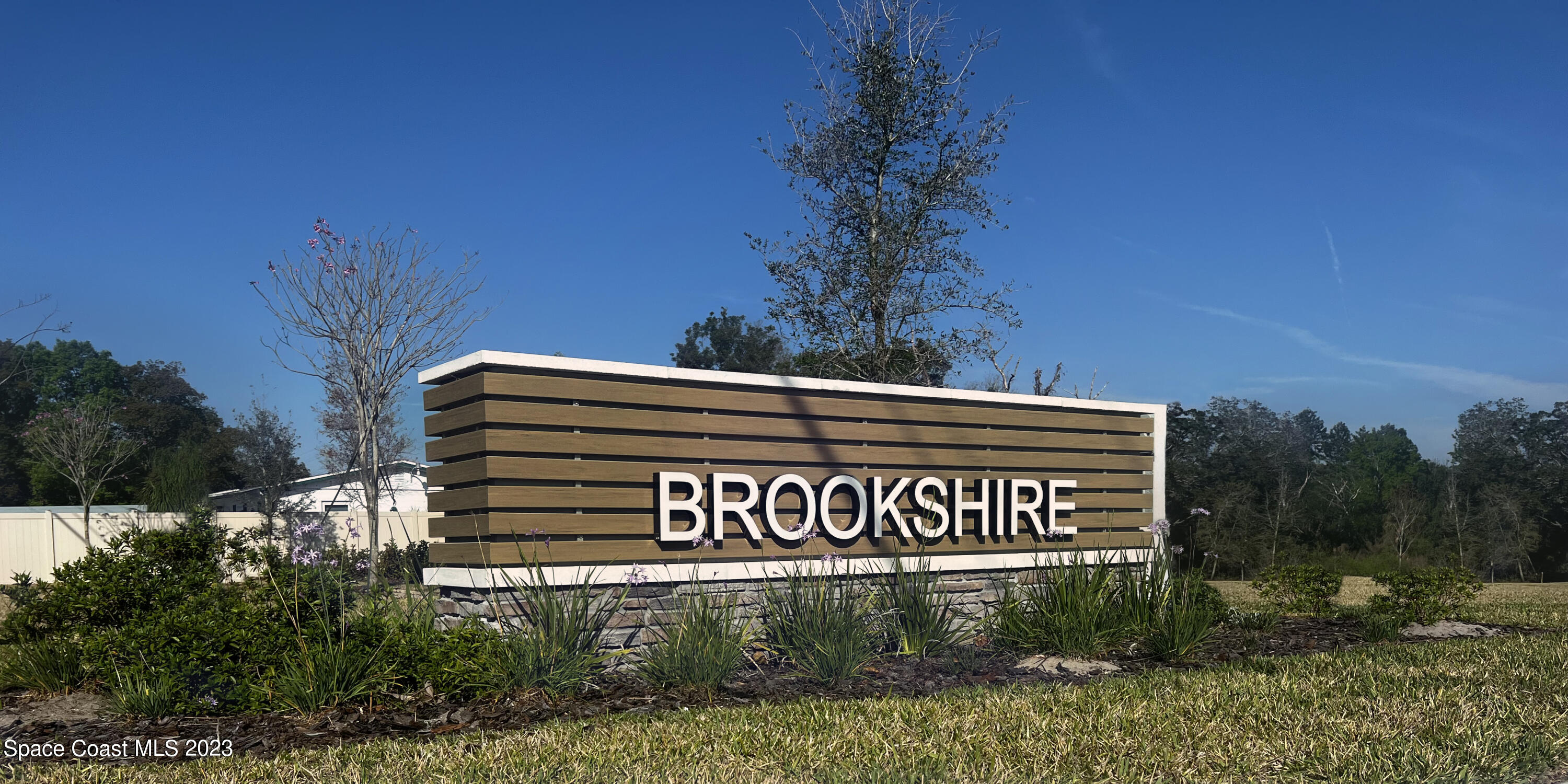 174 Compass Titusville, FL 32796 - Photo 2 of 32 a view of a sign board