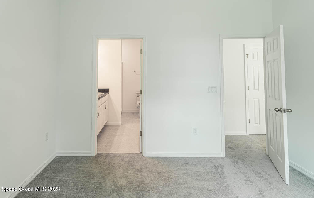 174 Compass Titusville, FL 32796 - Photo 23 of 32 an empty room with an entryway