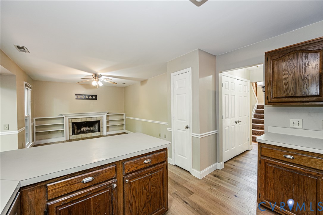 2806 Cove Ridge Road Midlothian, VA 23112 - Photo 35 of 52 Kitchen with wood-finish flooring and wood cabinet