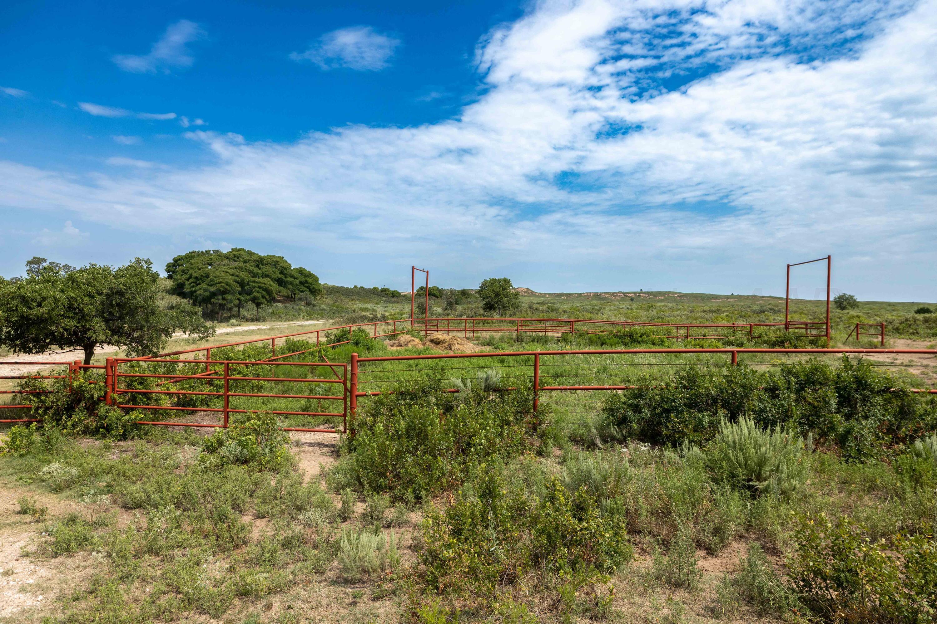 Christner Ranch Wheeler, TX 79096 - Photo 11 of 58 a view of a lake with houses in the back