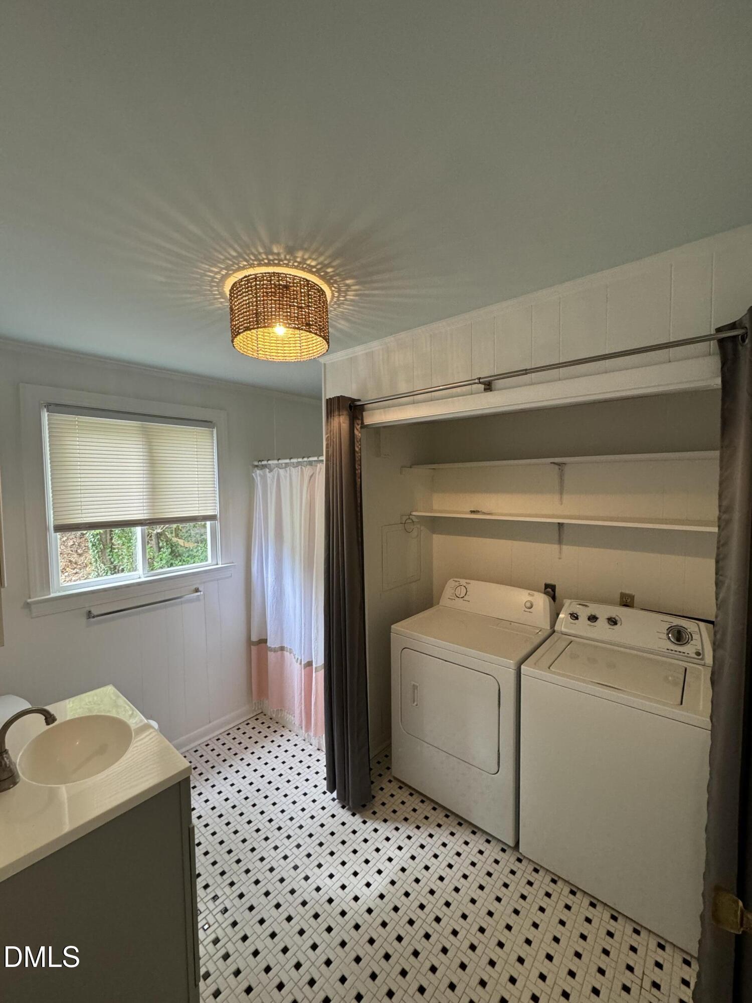 1009 Canterbury Road Raleigh, NC 27607 - Photo 11 of 31 a utility room with dryer and washer