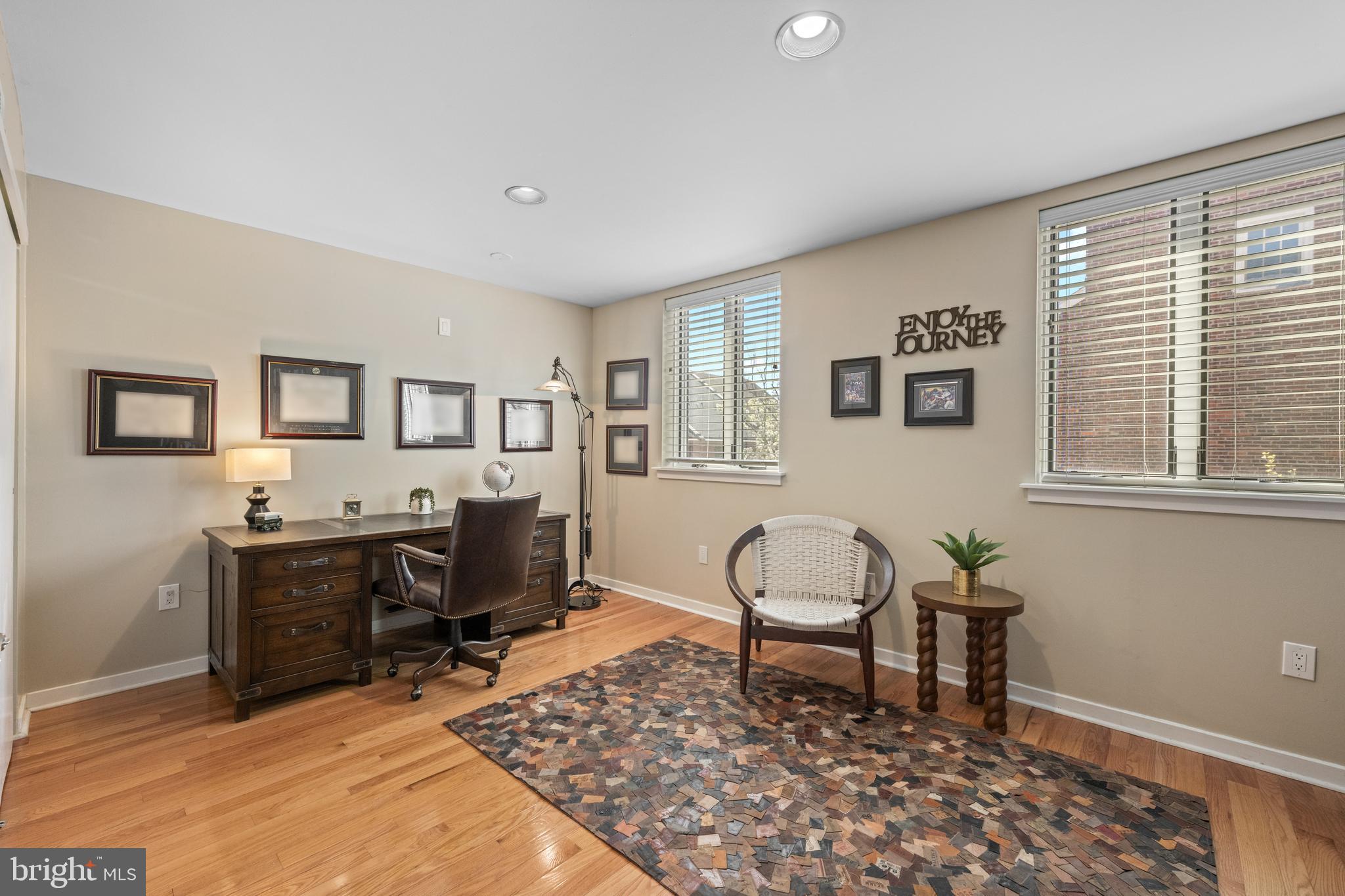 303 Spruce Street Philadelphia, PA 19106 - Photo 18 of 30 a living room with furniture a piano and a window