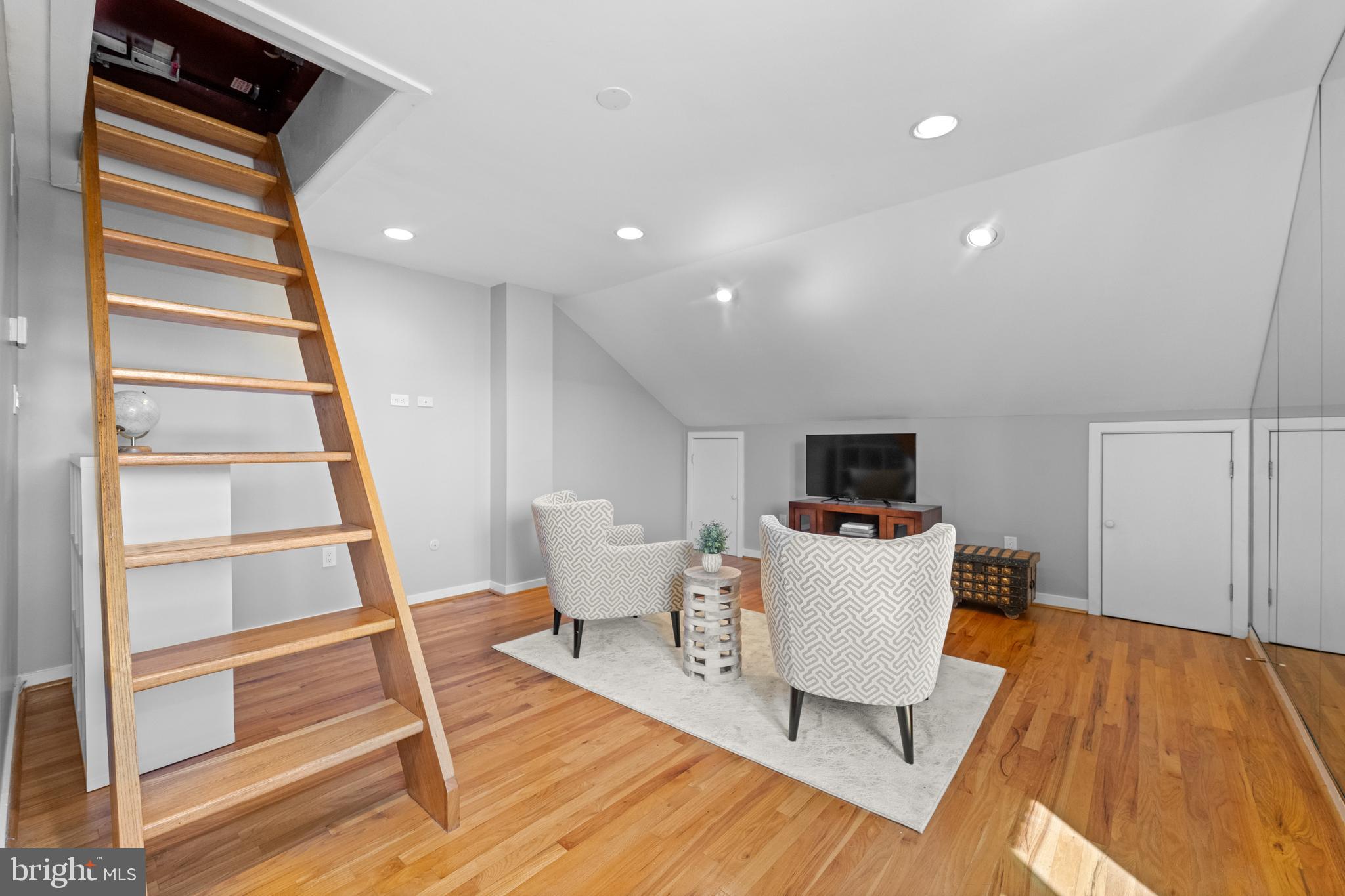 303 Spruce Street Philadelphia, PA 19106 - Photo 22 of 30 a view of a living room and a wooden floor