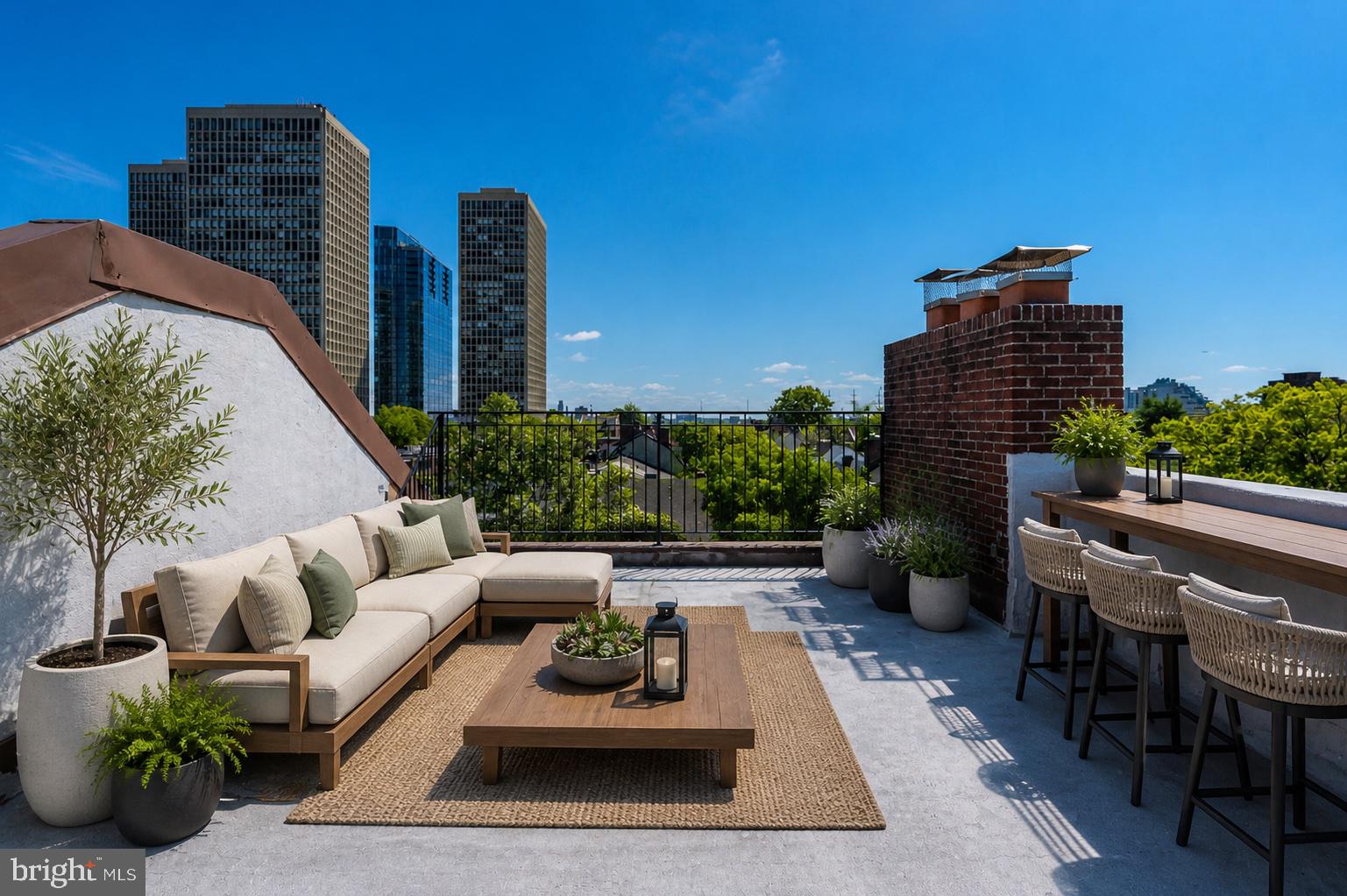 303 Spruce Street Philadelphia, PA 19106 - Photo 23 of 30 a view of a patio with couches and potted plants
