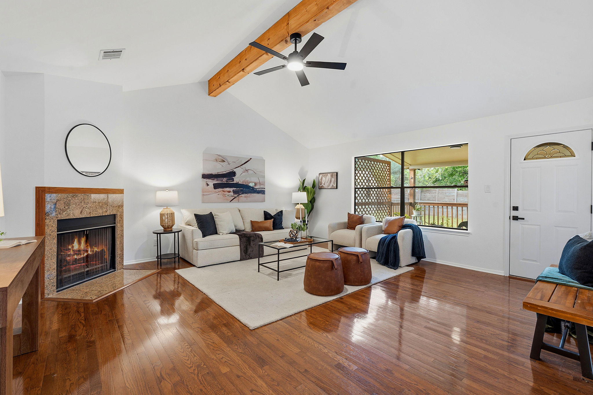 2702 Calabash Cove Austin, TX 78745 - Photo 6 of 40 a living room with furniture wooden floor and a fireplace